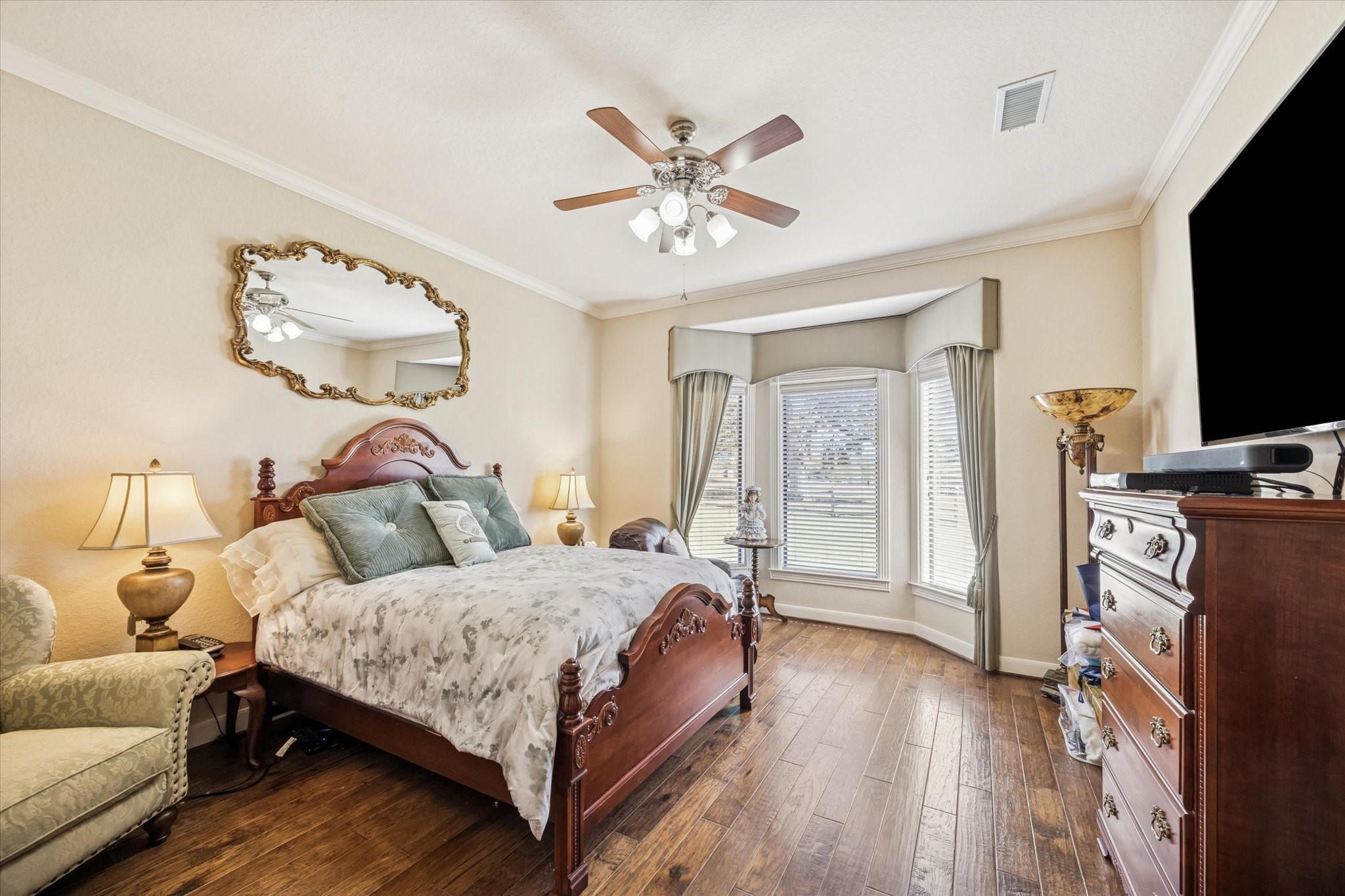 16372 Highway 6 Navasota, TX 77868 - Photo 25 of 49 a bedroom with a bed and a flat screen tv