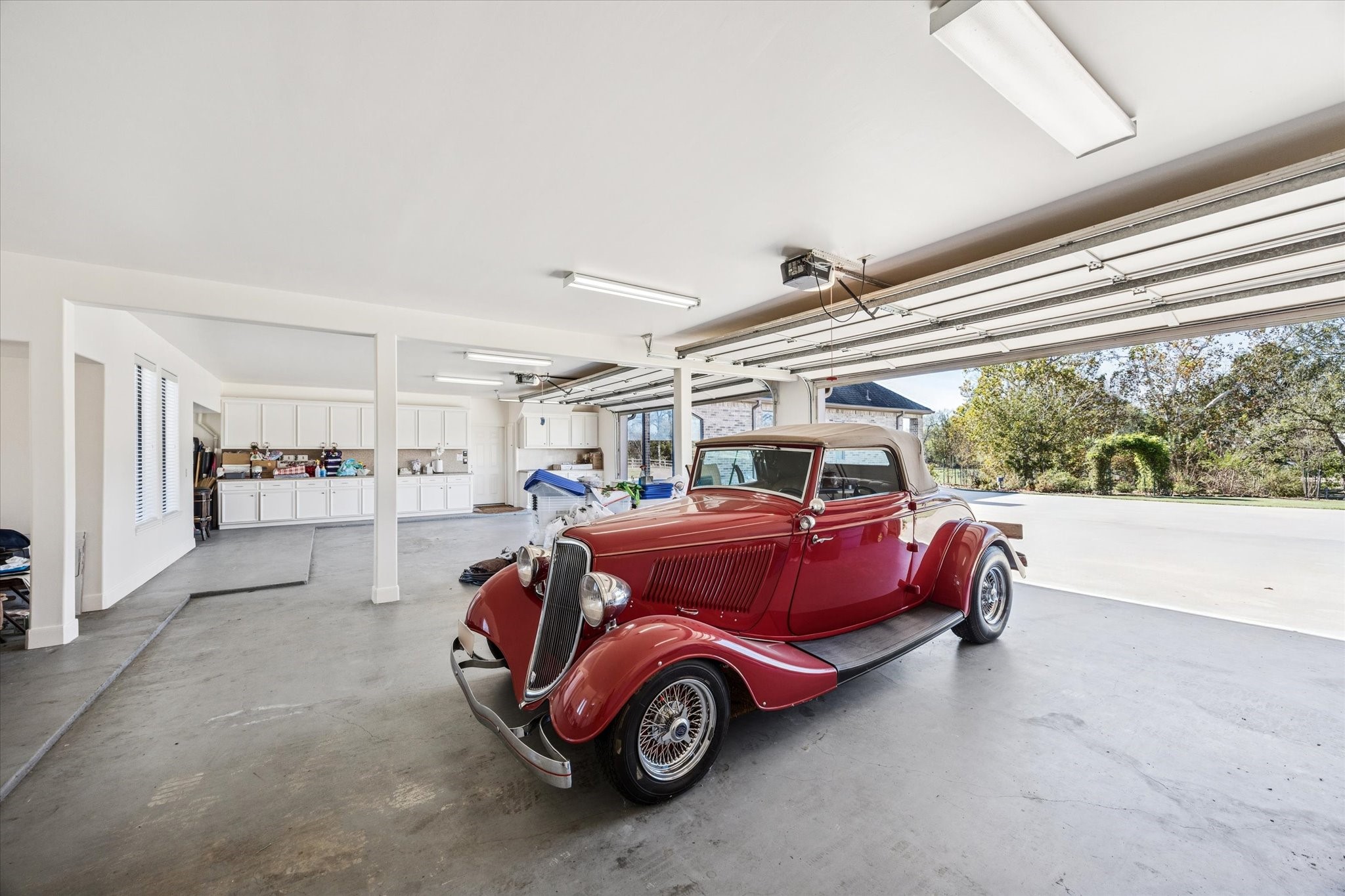 16372 Highway 6 Navasota, TX 77868 - Photo 32 of 49 a car parked in a parking room