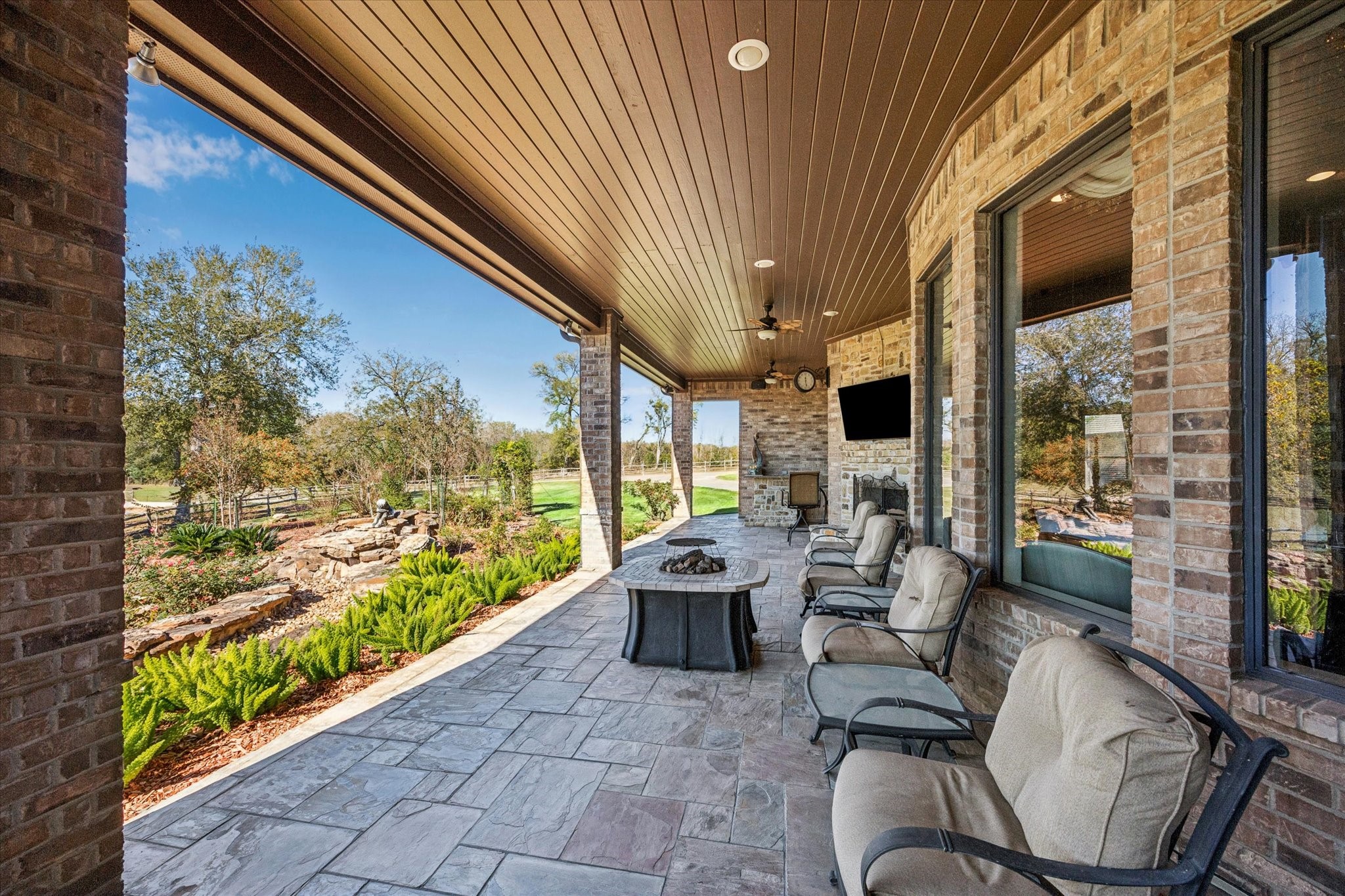 16372 Highway 6 Navasota, TX 77868 - Photo 33 of 49 a outdoor space with patio couch and wooden floor