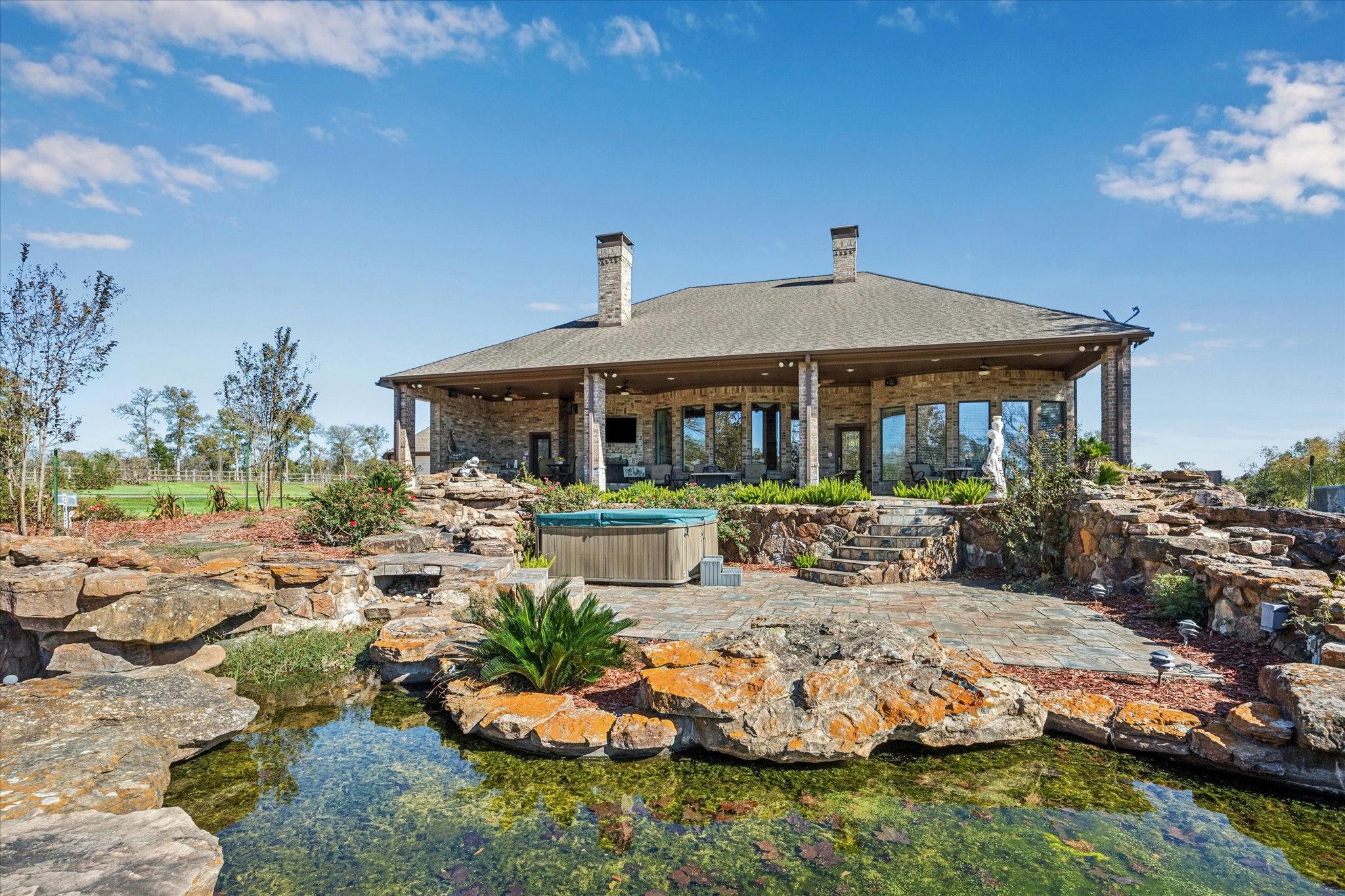 16372 Highway 6 Navasota, TX 77868 - Photo 35 of 49 a front view of a house with garden