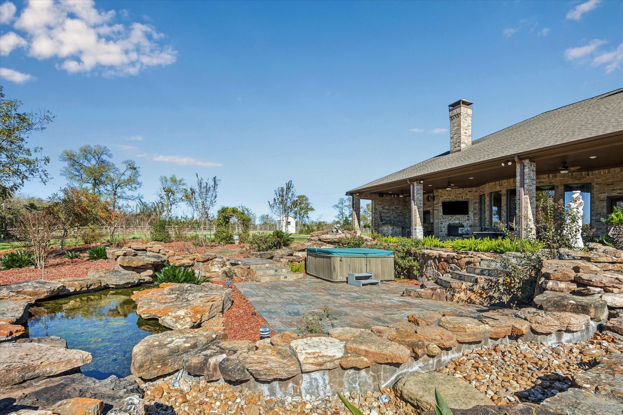 16372 Highway 6 Navasota, TX 77868 - Photo 36 of 49 a front view of a house with garden