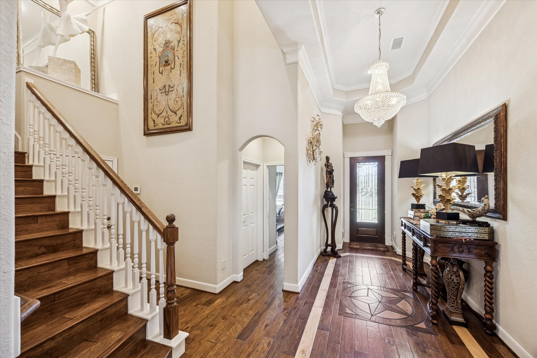 16372 Highway 6 Navasota, TX 77868 - Photo 9 of 49 a view of a hallway with wooden floor and staircase