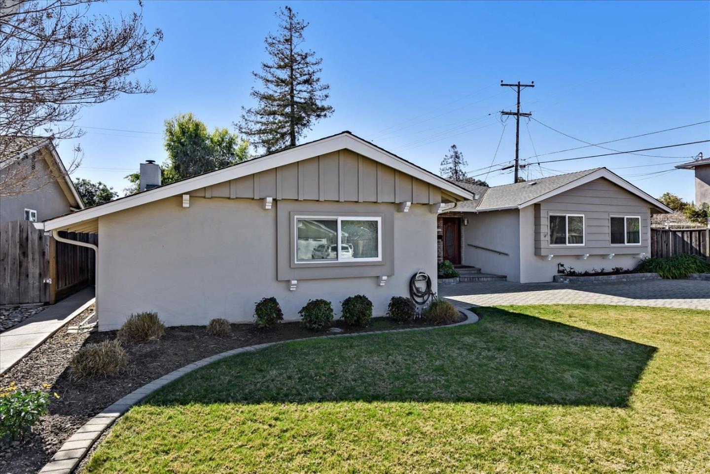 1712 St Anthony Drive San Jose, CA 95125 - Photo 2 of 47 a front view of a house with garden
