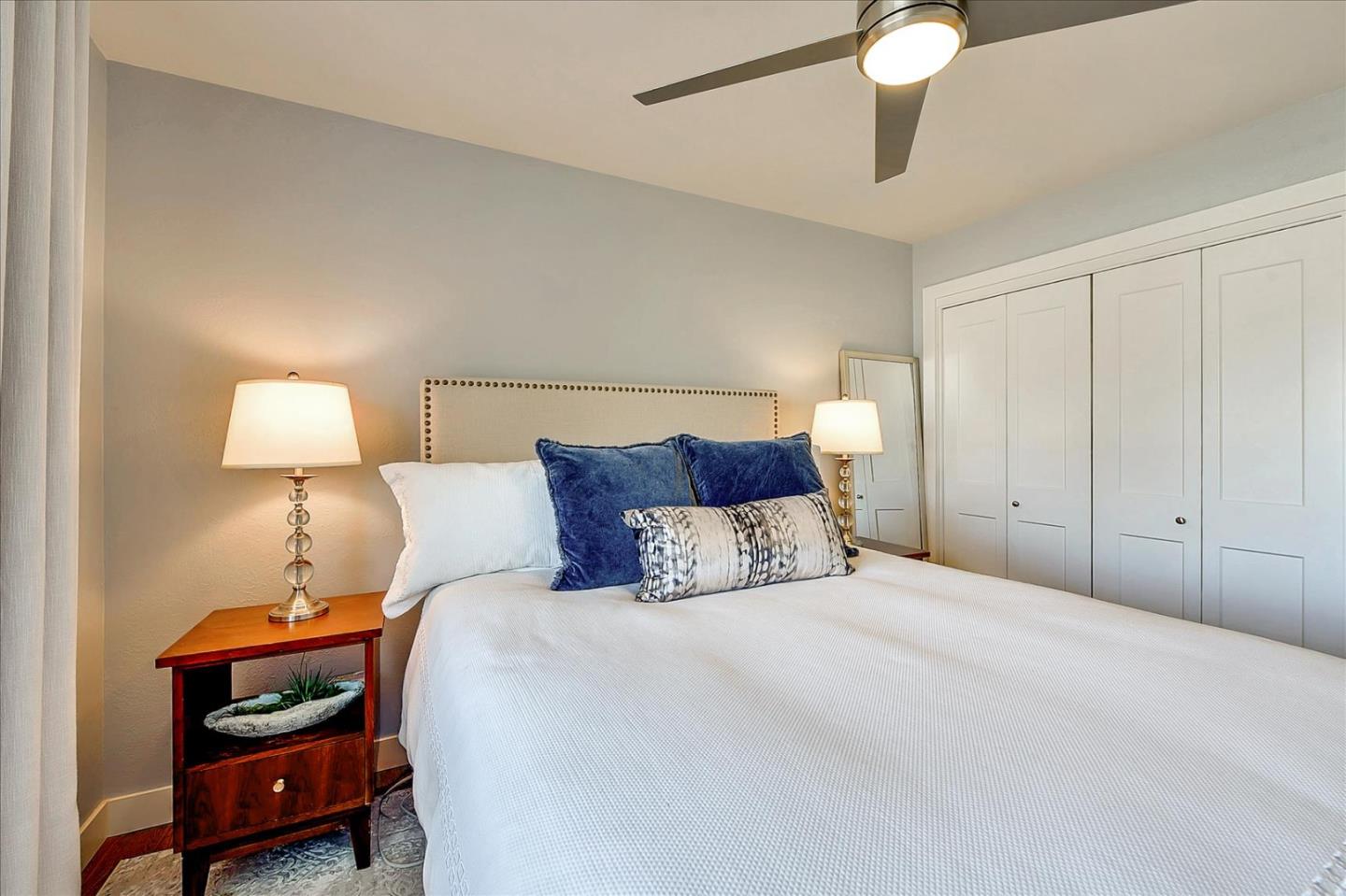 1712 St Anthony Drive San Jose, CA 95125 - Photo 26 of 47 a bedroom with a bed and a lamp