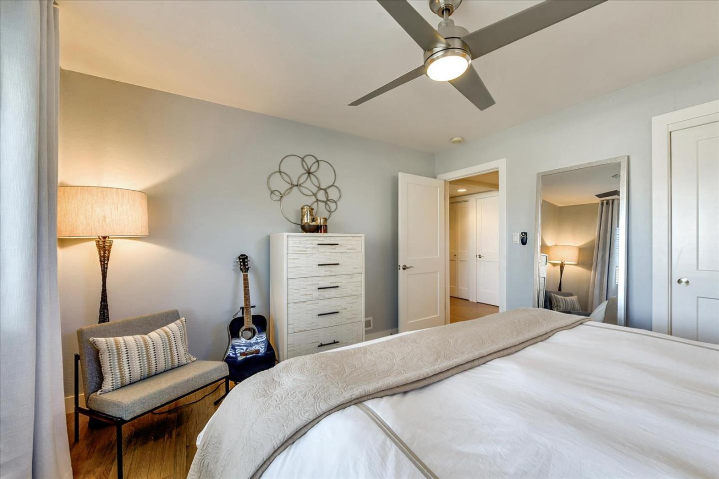 1712 St Anthony Drive San Jose, CA 95125 - Photo 30 of 47 a bedroom with a bed and a chandelier