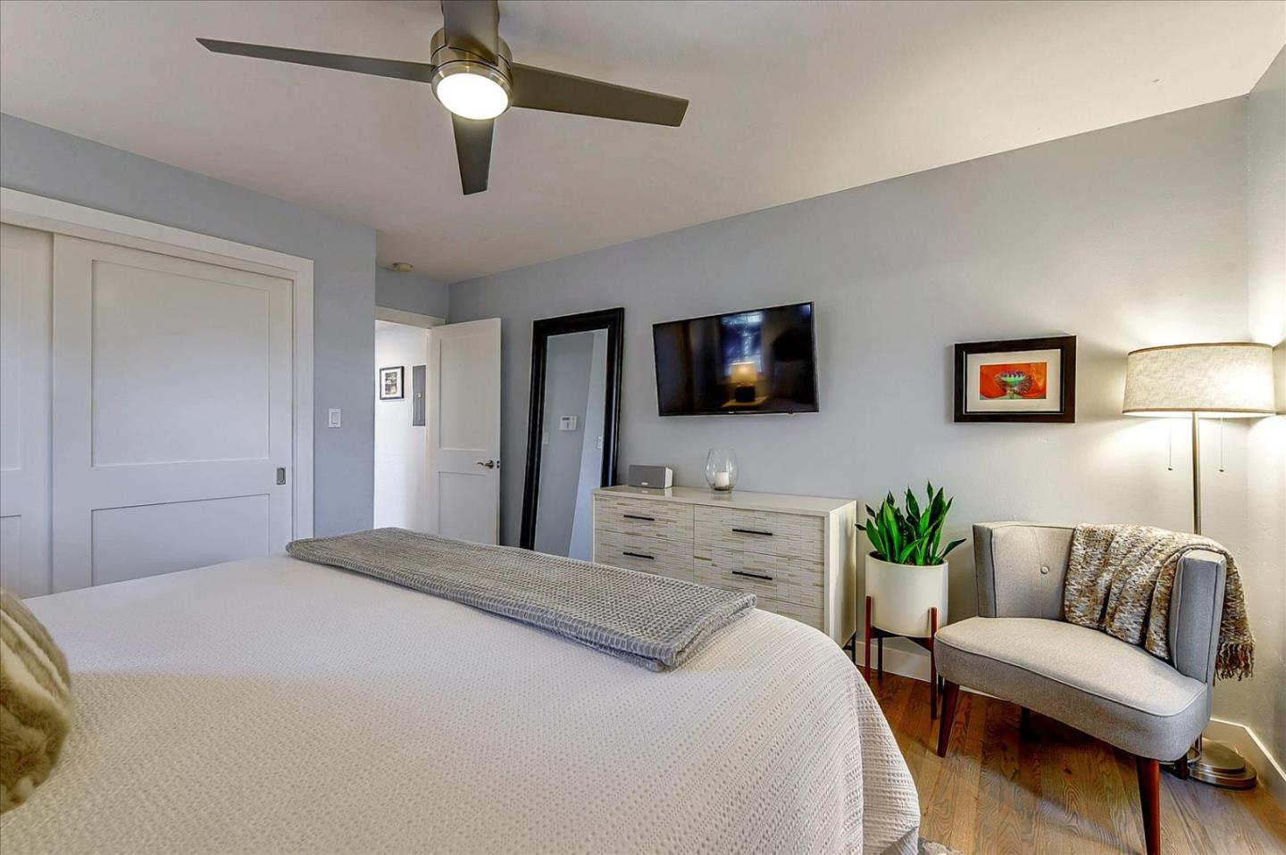 1712 St Anthony Drive San Jose, CA 95125 - Photo 33 of 47 a bedroom with a bed couch and a flat screen tv