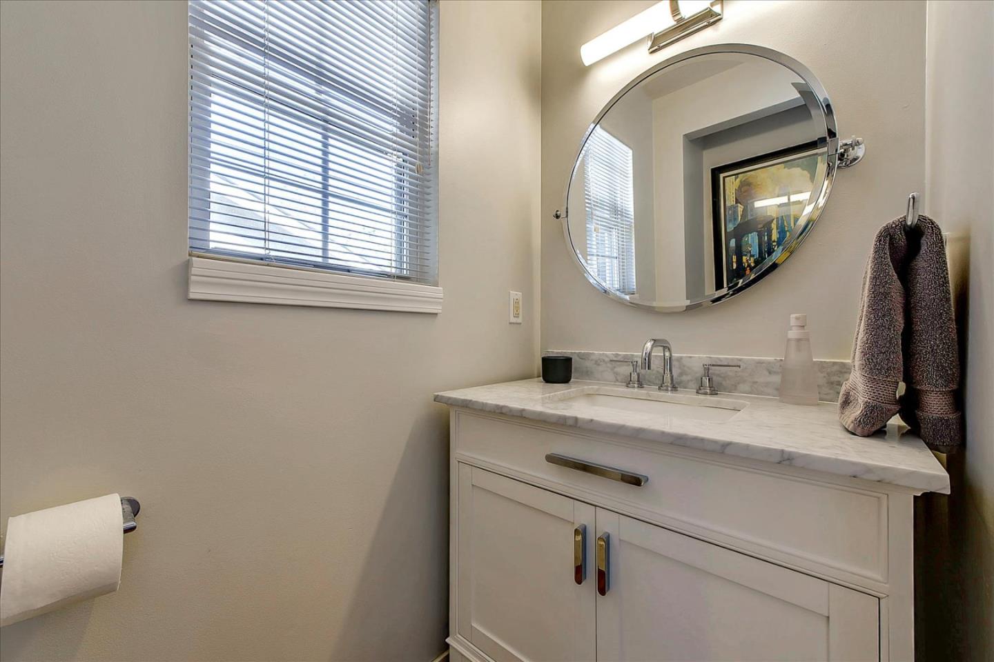 1712 St Anthony Drive San Jose, CA 95125 - Photo 39 of 47 a bathroom with a toilet sink and mirror