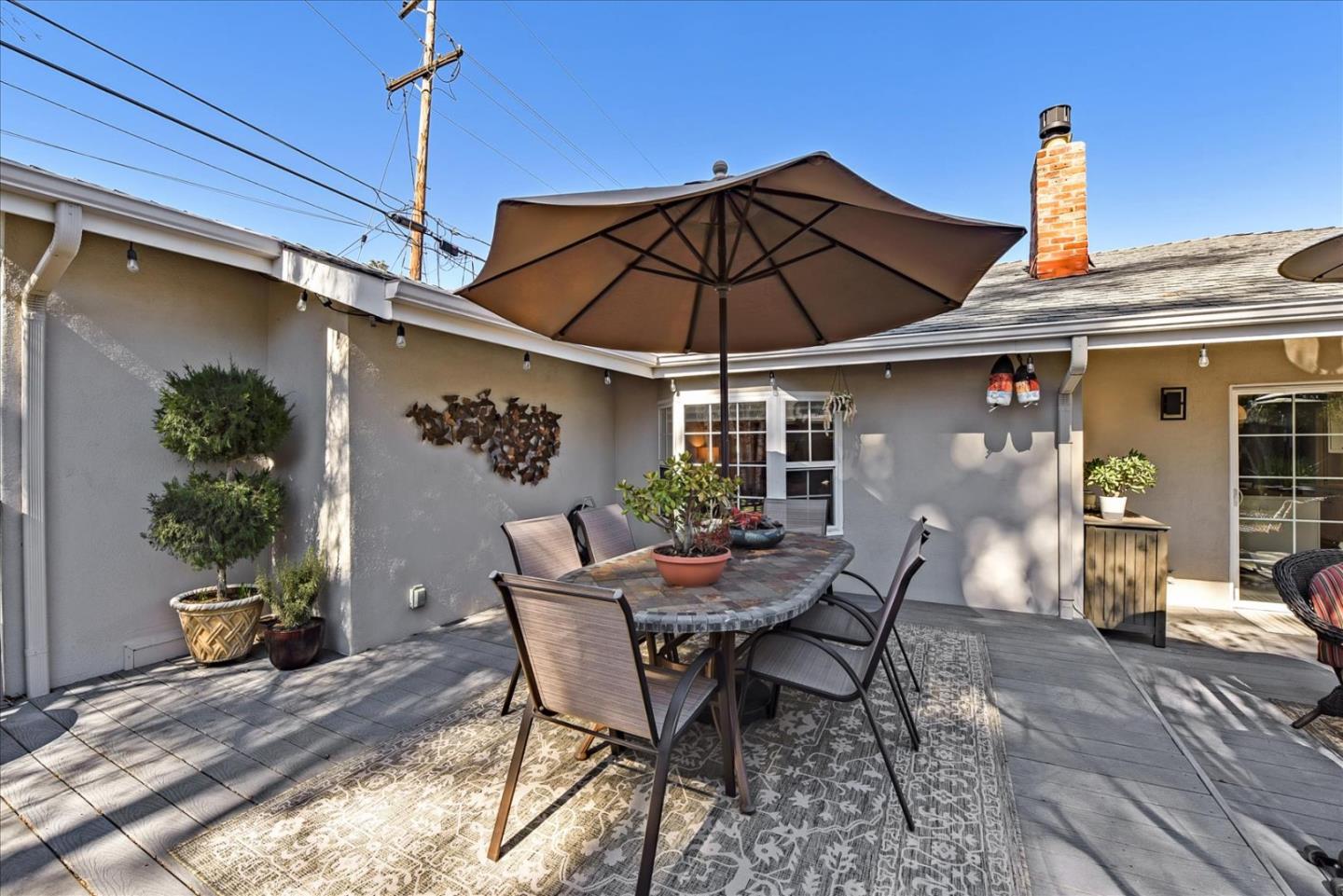 1712 St Anthony Drive San Jose, CA 95125 - Photo 42 of 47 a patio with a table and chairs