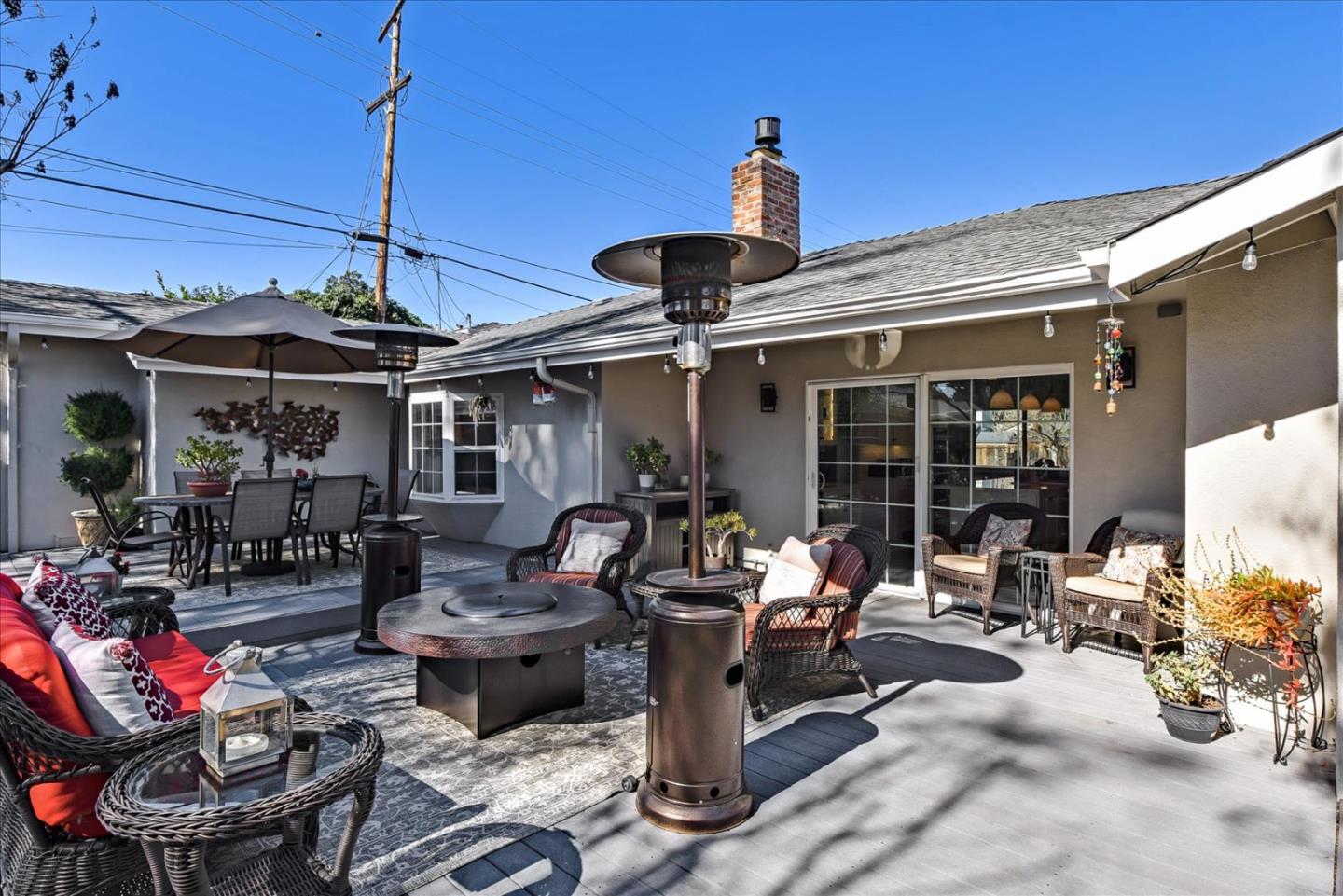1712 St Anthony Drive San Jose, CA 95125 - Photo 43 of 47 a view of a patio with dining table and chairs potted plants