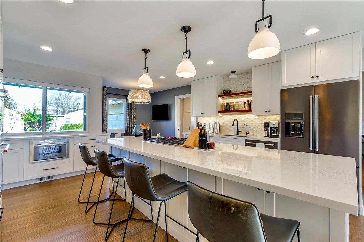 1712 St Anthony Drive San Jose, CA 95125 - Photo 10 of 47 a kitchen with stainless steel appliances a dining table chairs stove and refrigerator