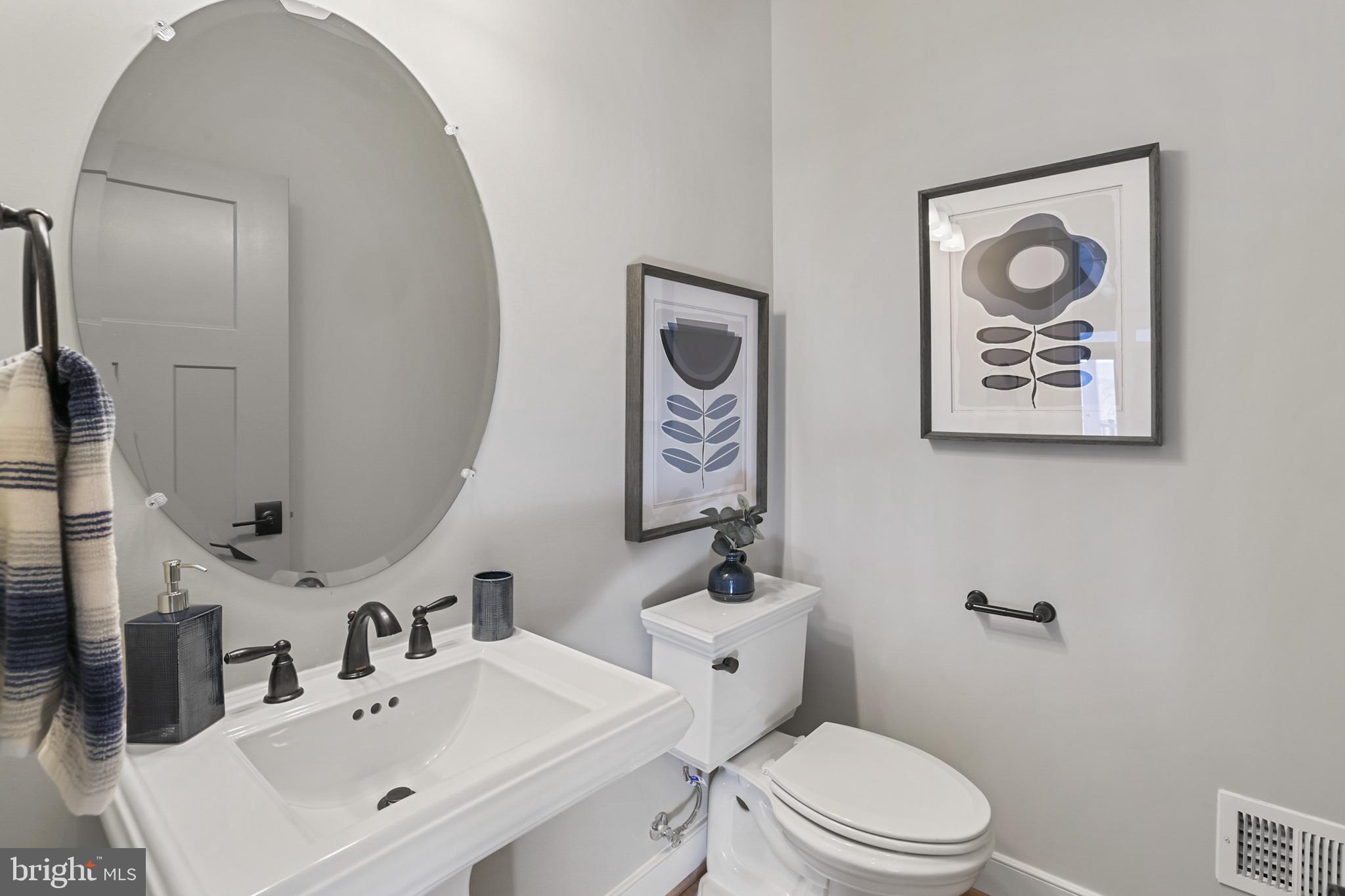 17628 Bates Drive Hamilton, VA 20158 - Photo 19 of 57 a bathroom with a toilet sink and mirror