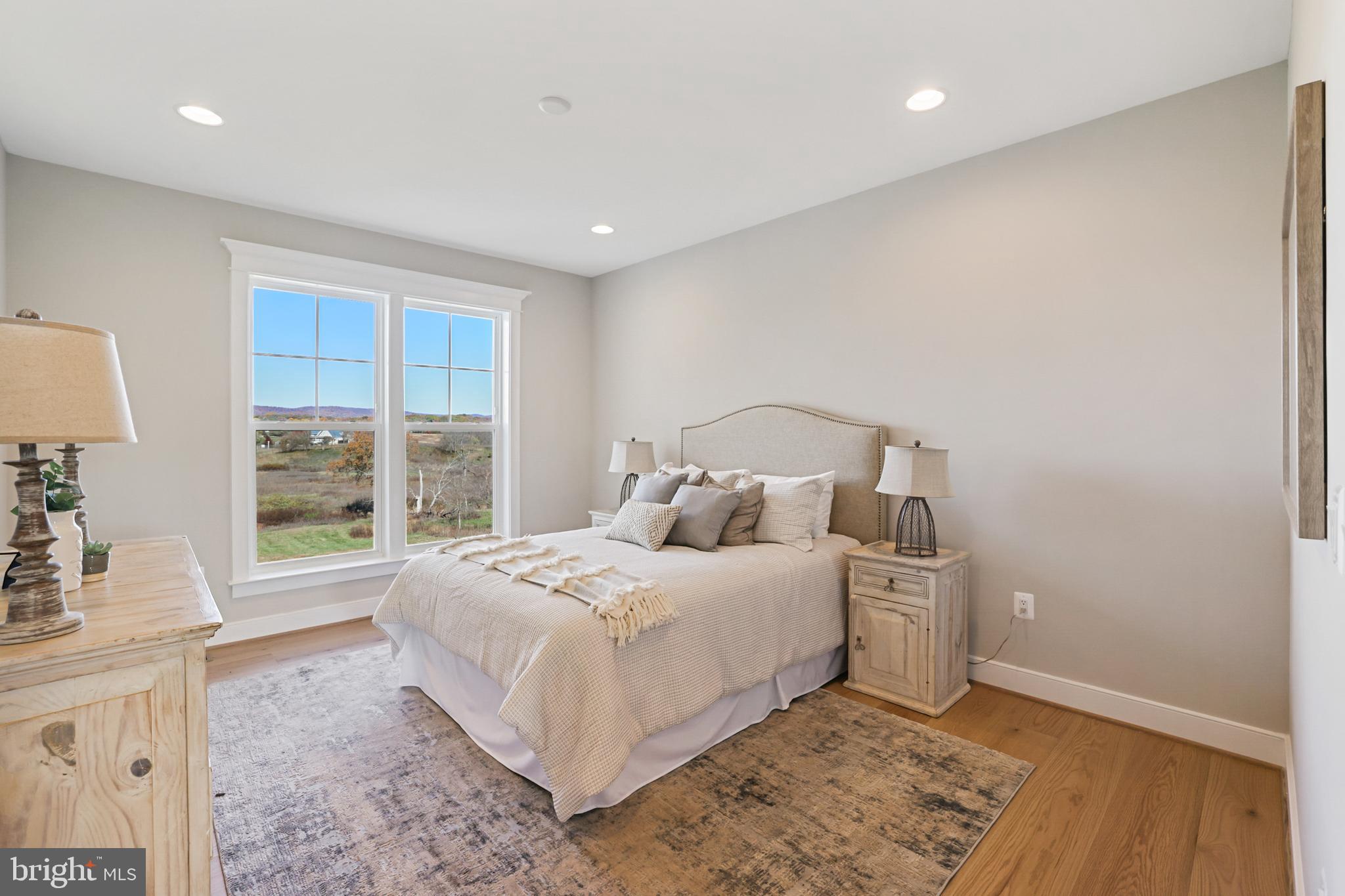 17628 Bates Drive Hamilton, VA 20158 - Photo 22 of 57 a bedroom with a bed and a window