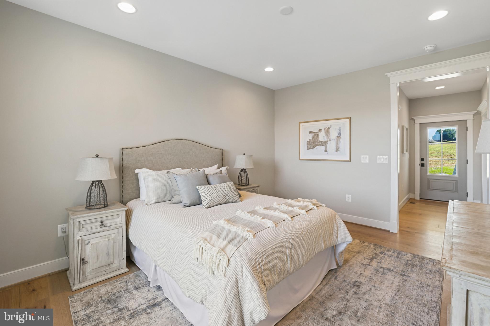 17628 Bates Drive Hamilton, VA 20158 - Photo 23 of 57 a bedroom with a bed and a view of bathroom
