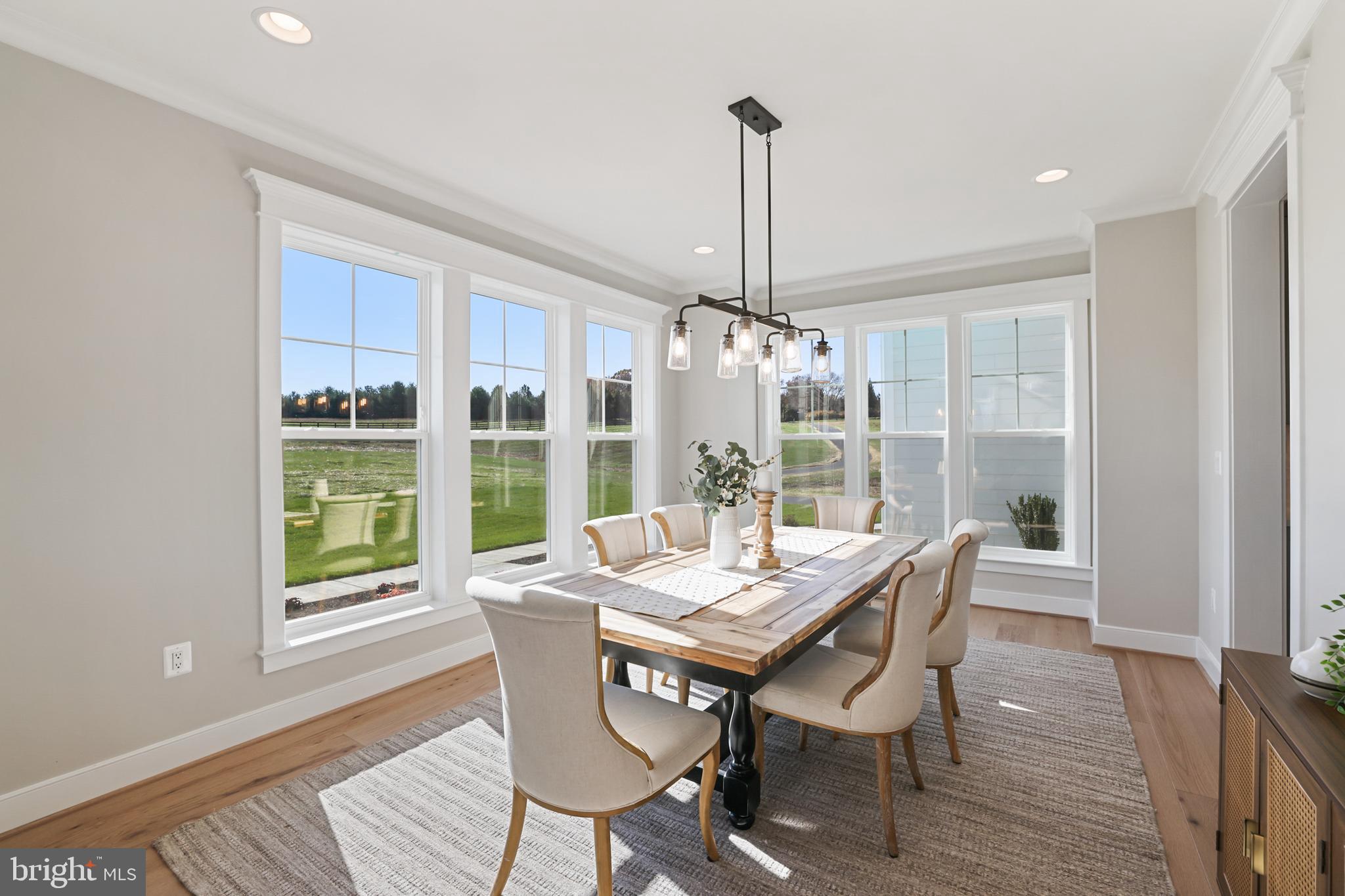 17628 Bates Drive Hamilton, VA 20158 - Photo 24 of 57 a view of a dining room with furniture window and wooden floor