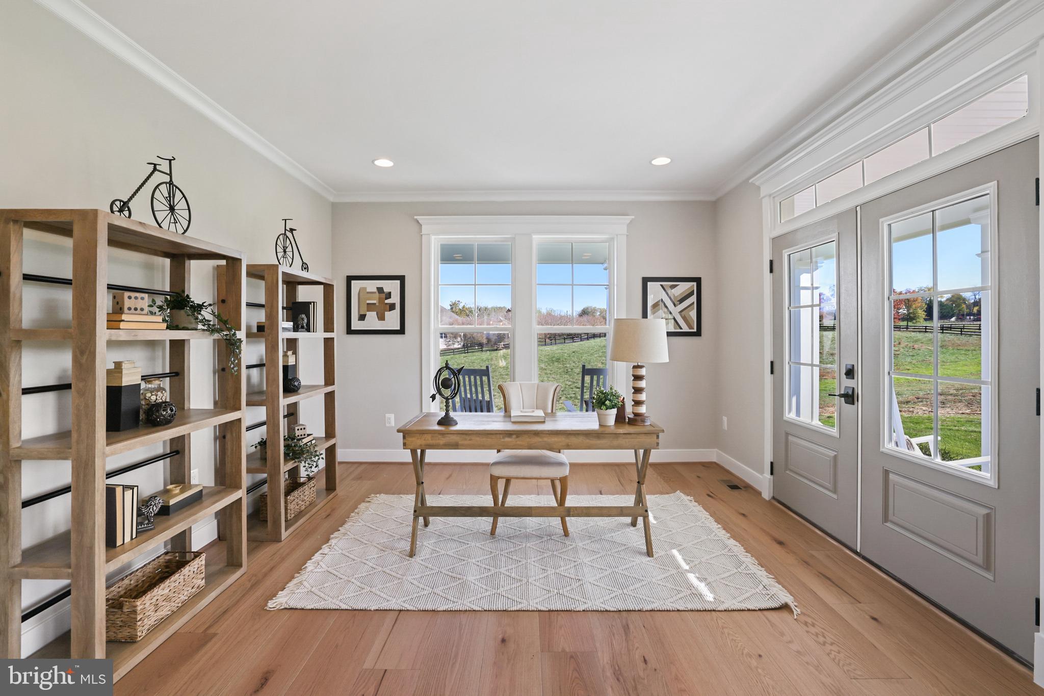 17628 Bates Drive Hamilton, VA 20158 - Photo 30 of 57 a living room with furniture and a book shelf