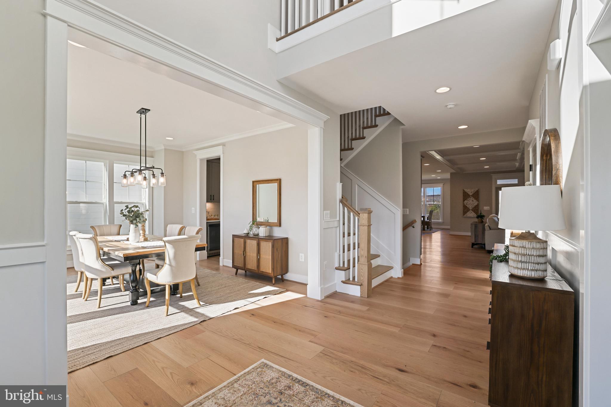 17628 Bates Drive Hamilton, VA 20158 - Photo 33 of 57 a living room with furniture a dining table and a large window