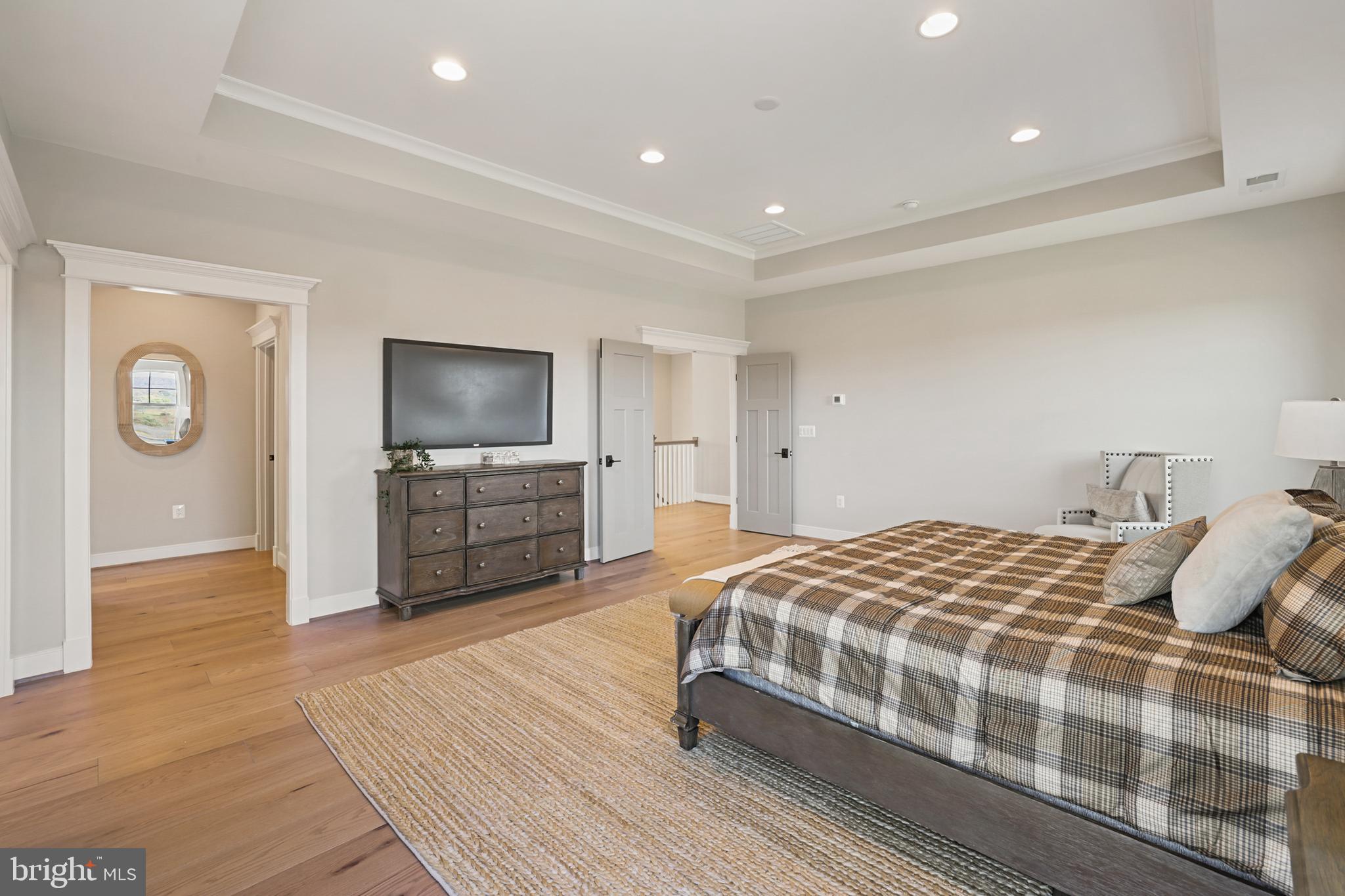 17628 Bates Drive Hamilton, VA 20158 - Photo 43 of 57 a bedroom with a bed and a television