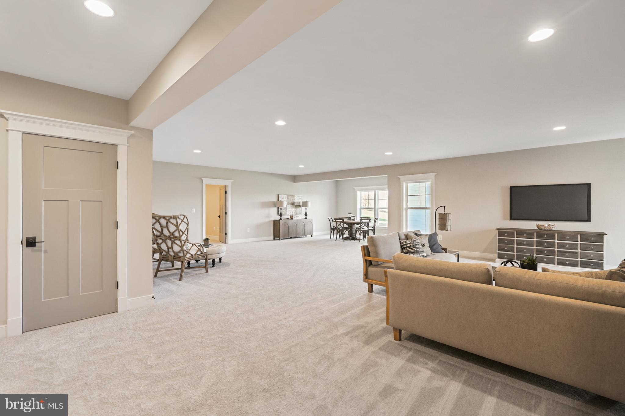 17628 Bates Drive Hamilton, VA 20158 - Photo 49 of 57 a living room with furniture and a flat screen tv