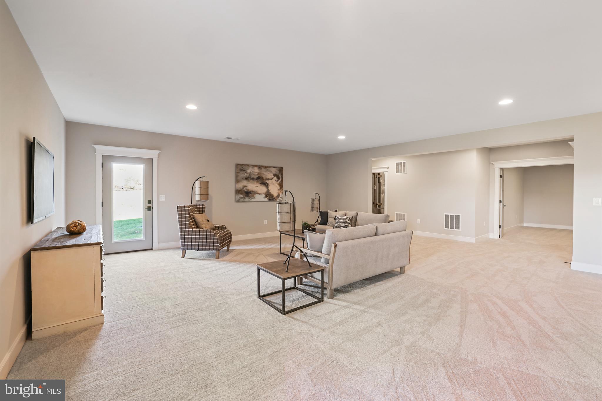 17628 Bates Drive Hamilton, VA 20158 - Photo 53 of 57 a living room with furniture and a wooden floor