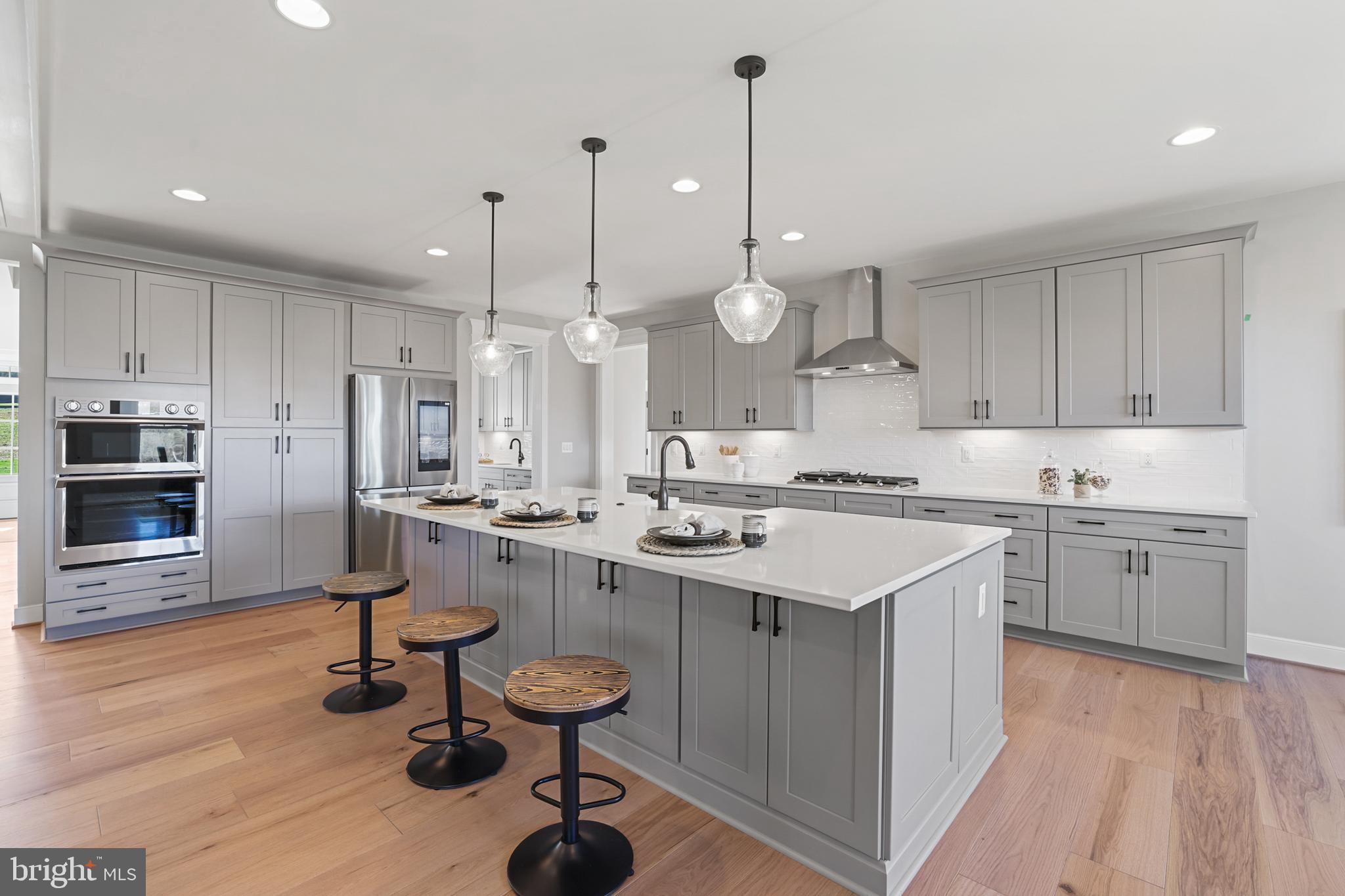 17628 Bates Drive Hamilton, VA 20158 - Photo 10 of 57 a kitchen with a sink stainless steel appliances and cabinets