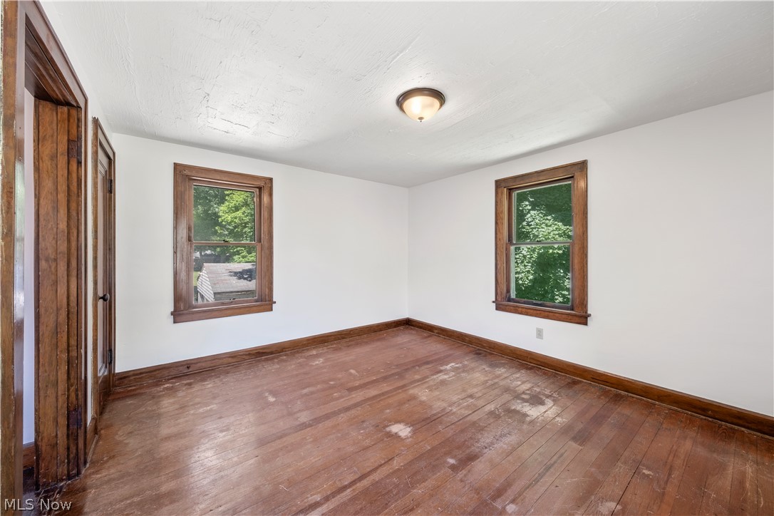 317 Ruckel Road Akron, OH 44305 - Photo 5 of 30 Spare room with wood-type flooring