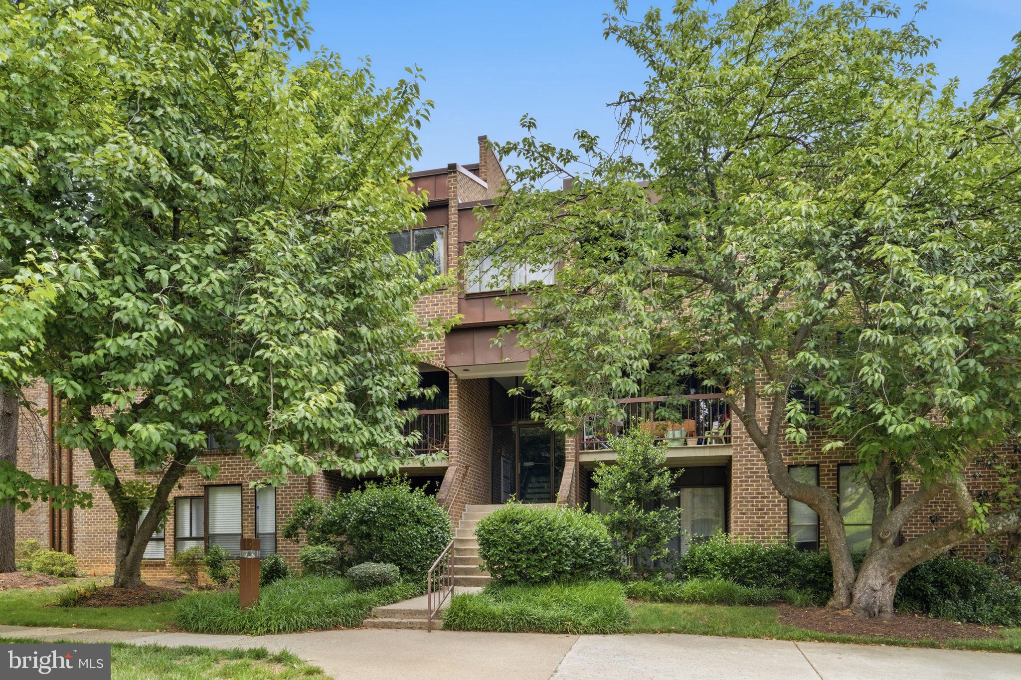11260 Chestnut Grove Square, Unit 337 Reston, VA 20190 - Photo 58 of 82 Charming residence amid lush greenery.