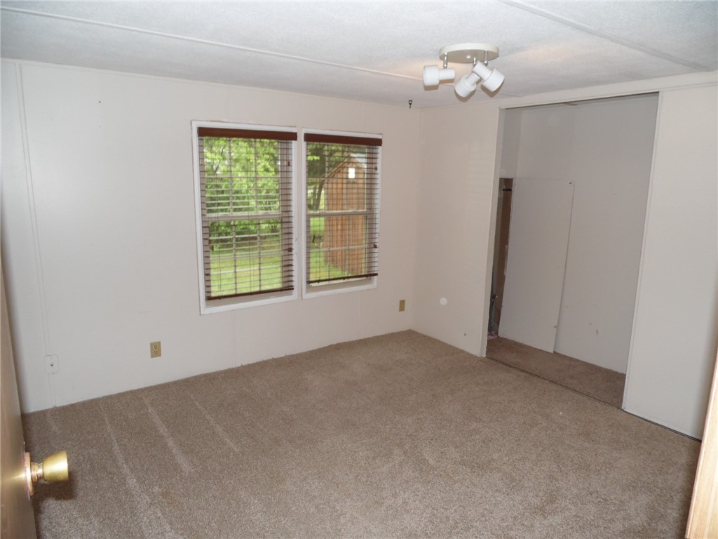 25 Lear Drive Coventry, RI 02816 - Photo 15 of 24 2nd bedroom (H2O tank storage in closet_