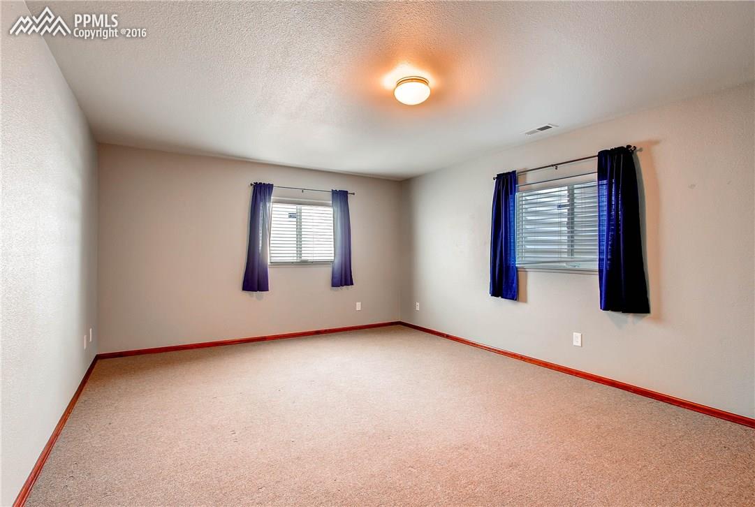 12330 Motley Road Peyton, CO 80831 - Photo 22 of 27 Space for everyone when you have 5 bedrooms!