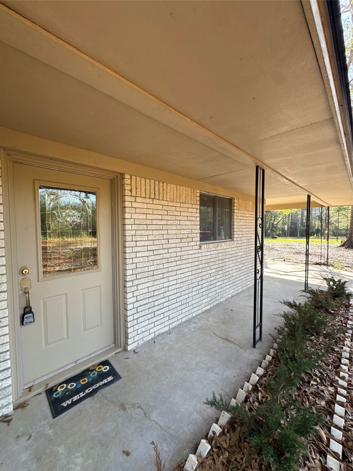 263 County Road 355 Jasper, TX 75951 - Photo 14 of 45 a view of a house with a backyard