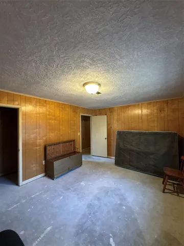 a livingroom with furniture and a window