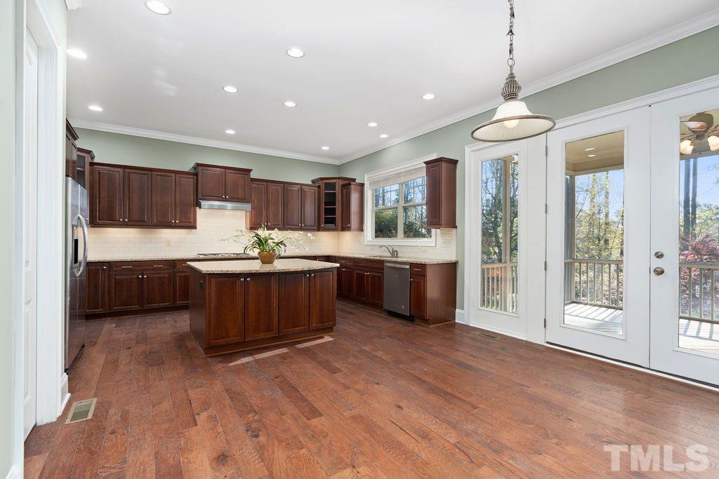 3322 Roller Mill Court Raleigh, NC 27607 - Photo 11 of 30 doors to screen porch