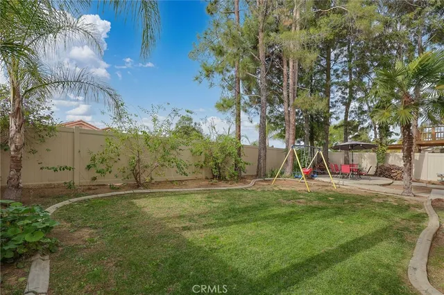 a view of a playground with basketball court