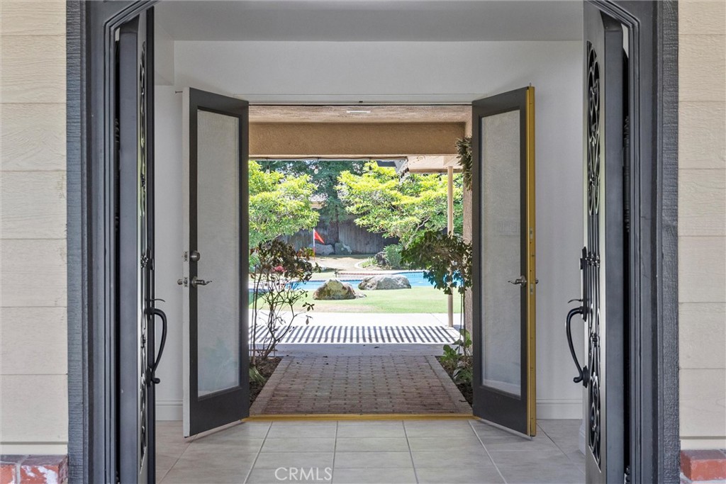 11717 Old Town Road Bakersfield, CA 93312 - Photo 16 of 61 a view of a room that has a large window and front door