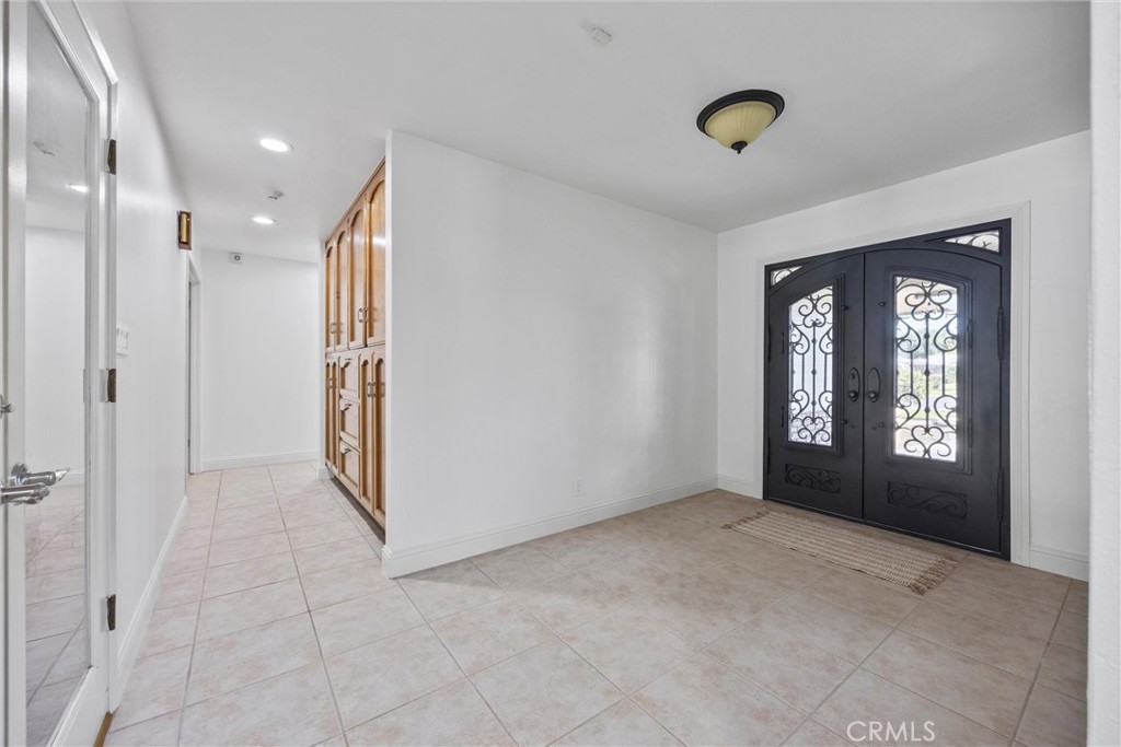 11717 Old Town Road Bakersfield, CA 93312 - Photo 18 of 61 a view of entryway and hall with a window
