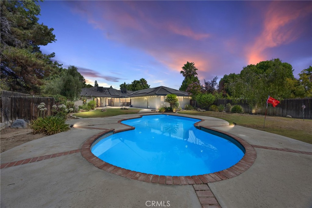 11717 Old Town Road Bakersfield, CA 93312 - Photo 2 of 61 a view of a swimming pool with a yard