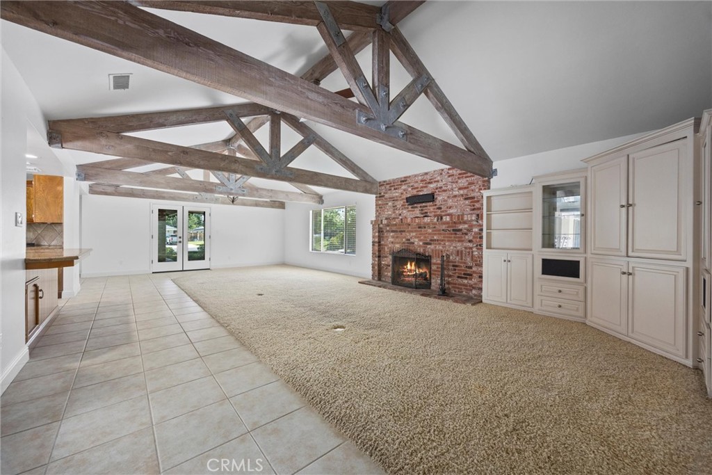 11717 Old Town Road Bakersfield, CA 93312 - Photo 25 of 61 a view of an empty room with a fireplace and a window
