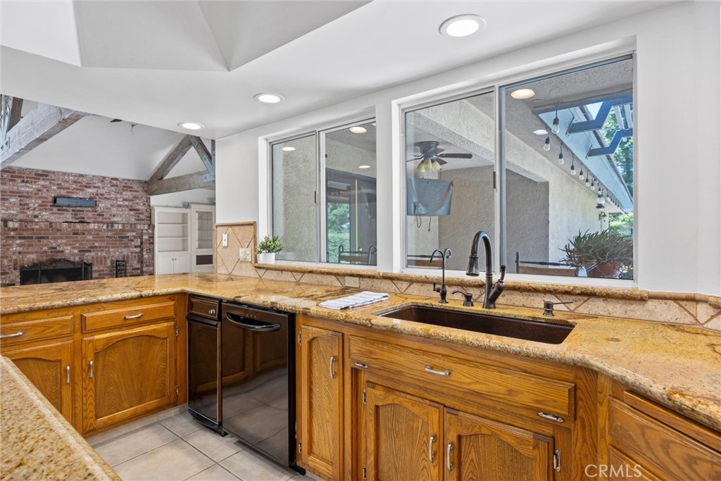 11717 Old Town Road Bakersfield, CA 93312 - Photo 29 of 61 a kitchen with a sink and cabinets