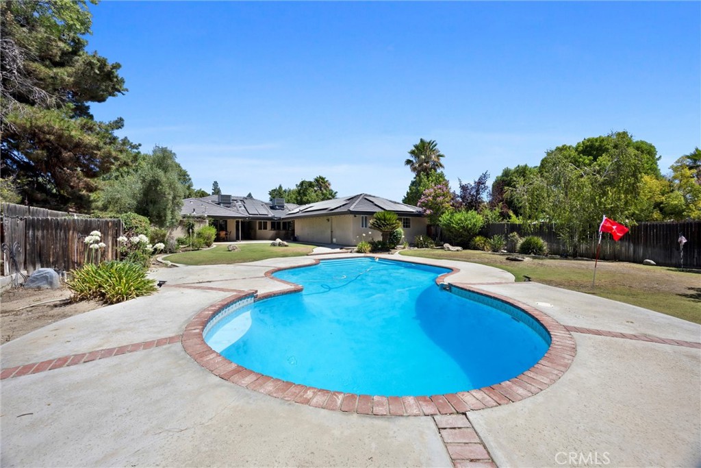 11717 Old Town Road Bakersfield, CA 93312 - Photo 55 of 61 a view of a swimming pool with an outdoor space