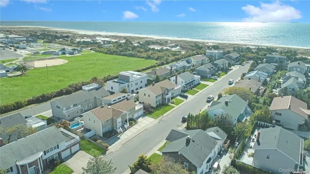 an aerial view of a city with lots of residential buildings