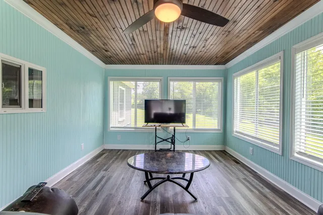 a room with furniture and a window