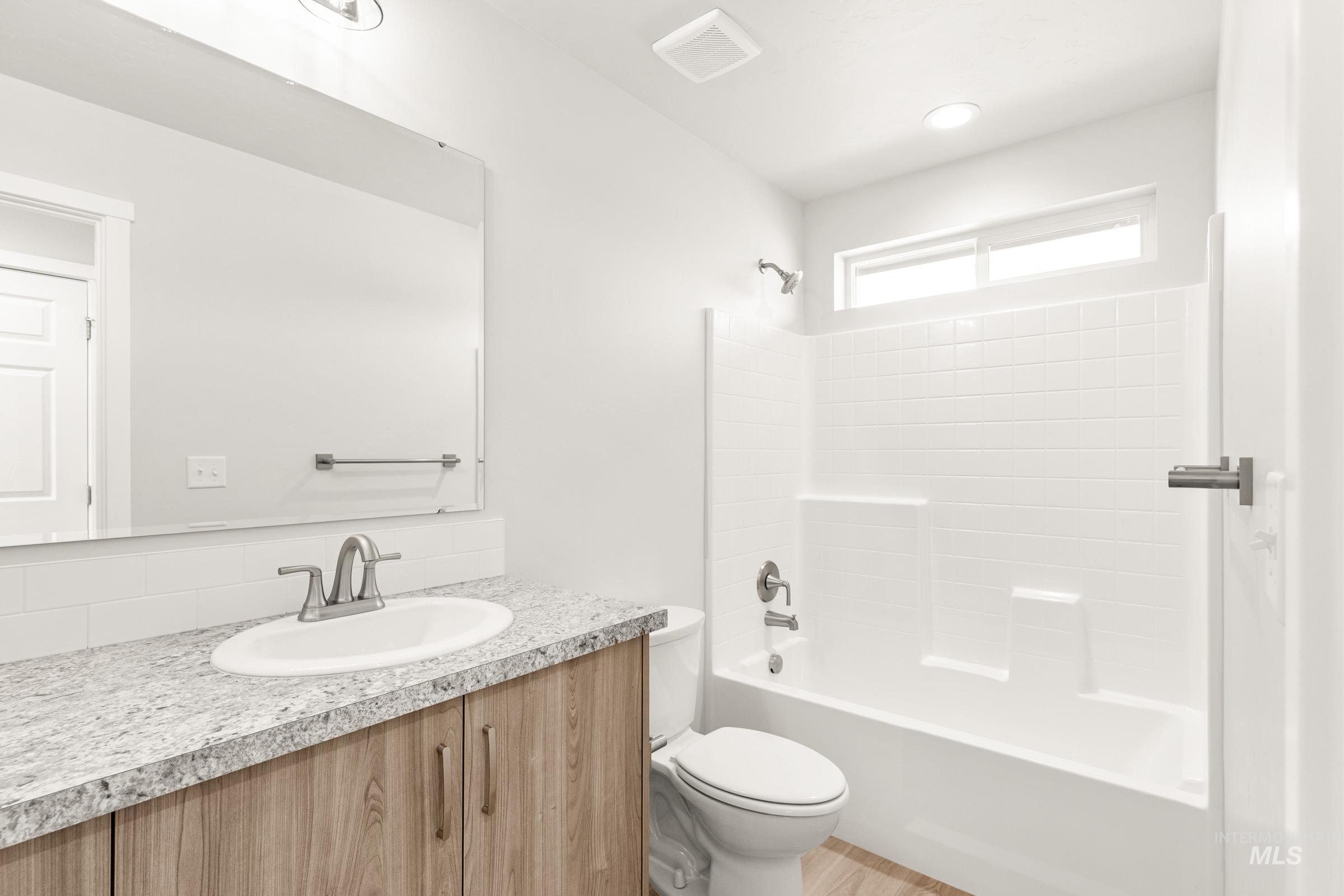 13716 Redway Court Caldwell, ID 83607 - Photo 13 of 18 Full bathroom with vanity and shower / bathtub combination