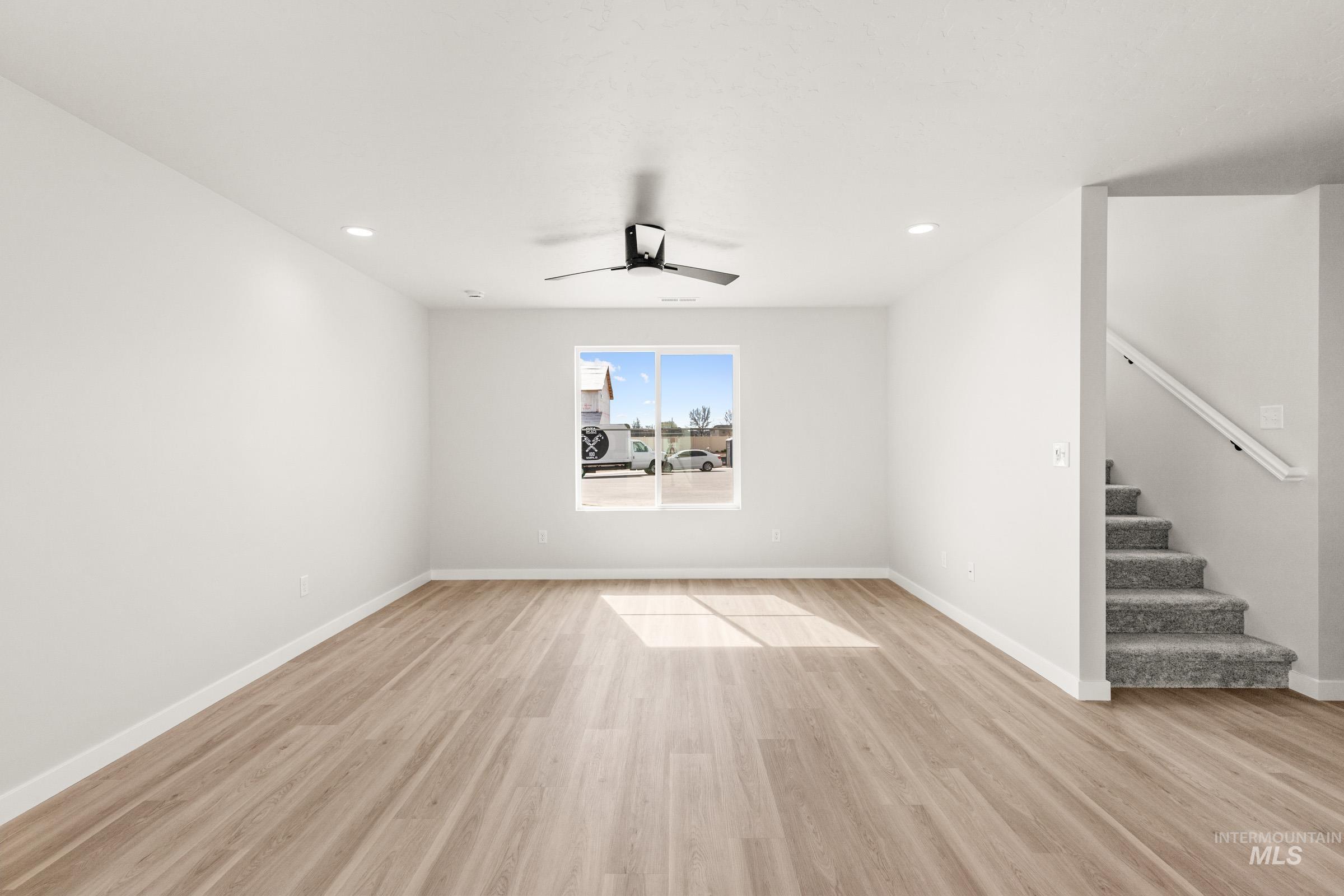 13716 Redway Court Caldwell, ID 83607 - Photo 6 of 18 Unfurnished room with light wood-type flooring, ceiling fan, and recessed lighting