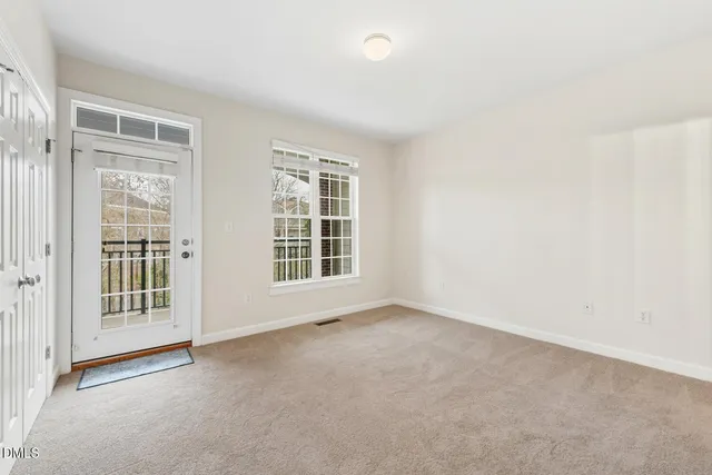 a bathroom with a granite countertop shower and a sink