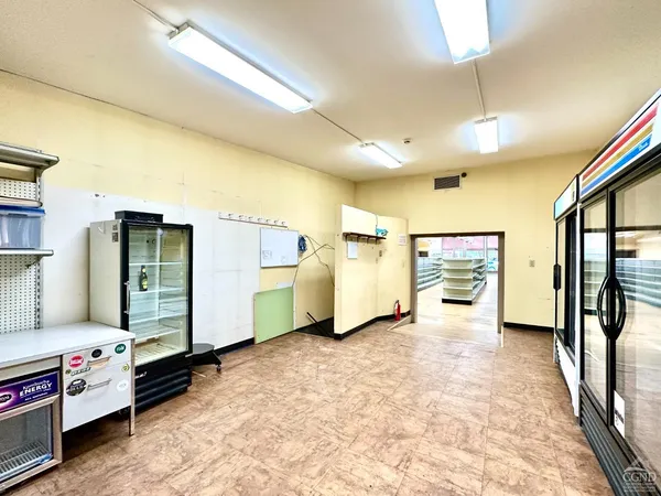 a view of a hallway with workspace