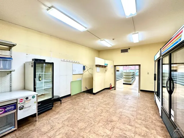 a view of a hallway with workspace