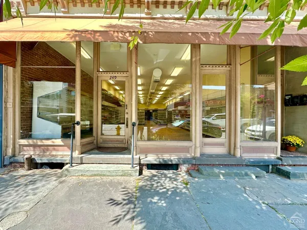a view of a building with door and outdoor space