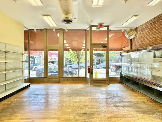 a view of a living room and window