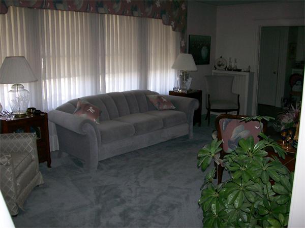 3 Pilgrim Road Marblehead, MA 01945 - Photo 3 of 6 a living room with furniture and a potted plant