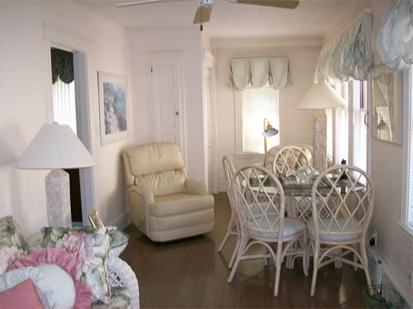 3 Pilgrim Road Marblehead, MA 01945 - Photo 5 of 6 a living room with furniture and a chandelier