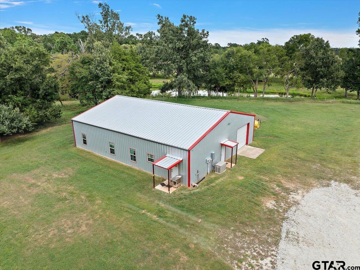 an aerial view of a house having yard